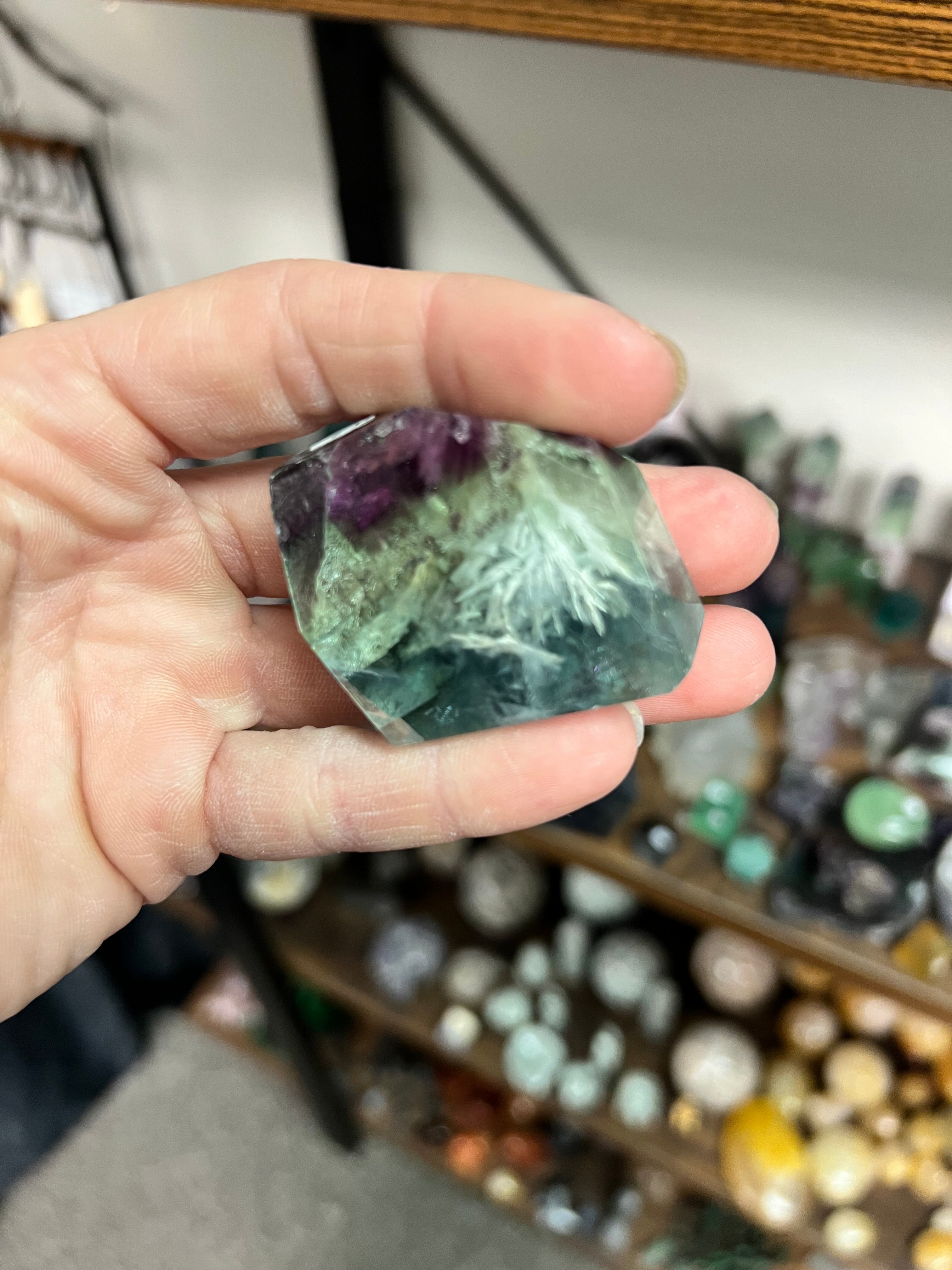 Rainbow feather fluorite gusher