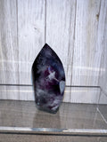 Purple Amethyst flame with quartz inclusions