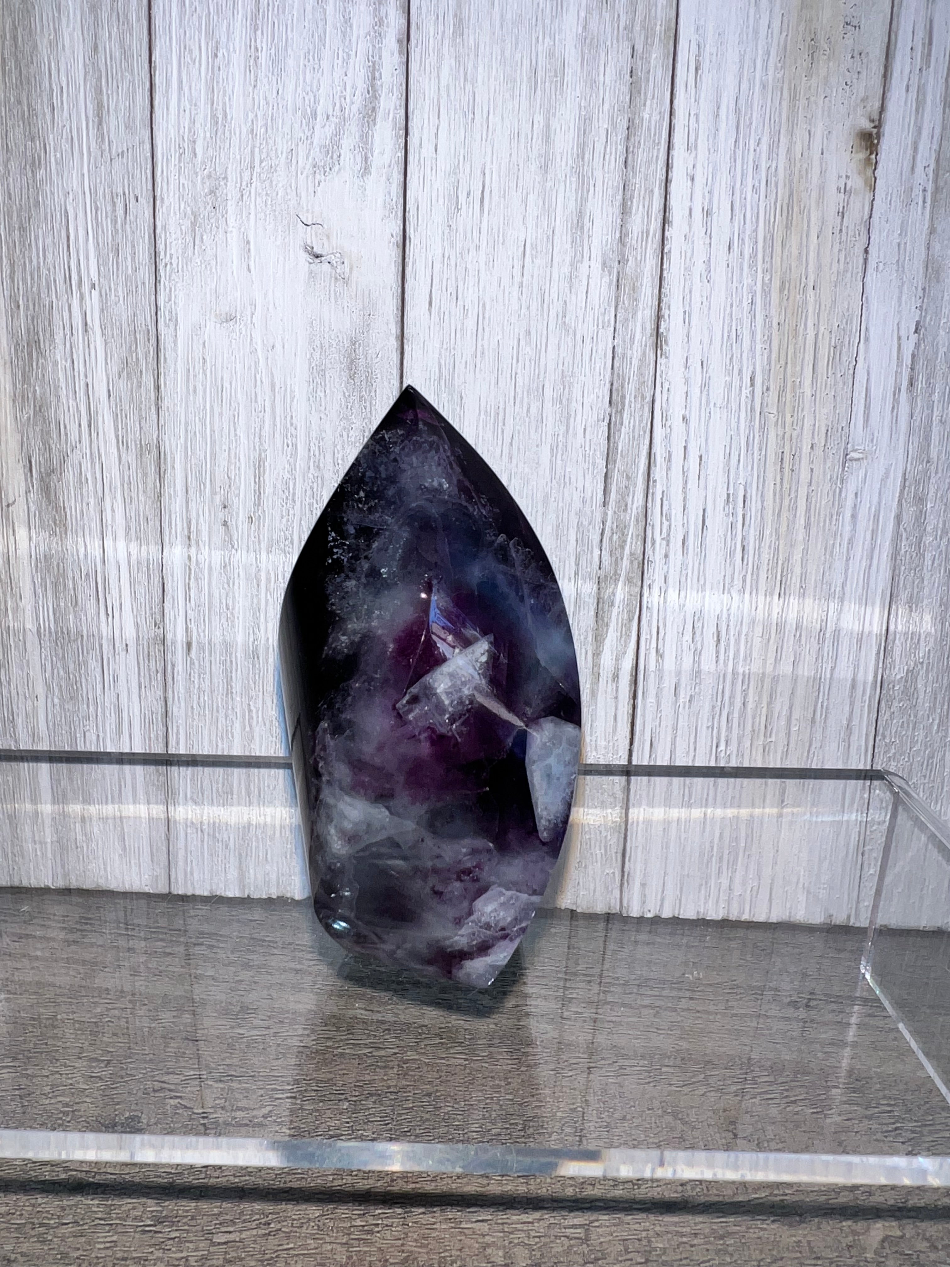 Purple Amethyst flame with quartz inclusions